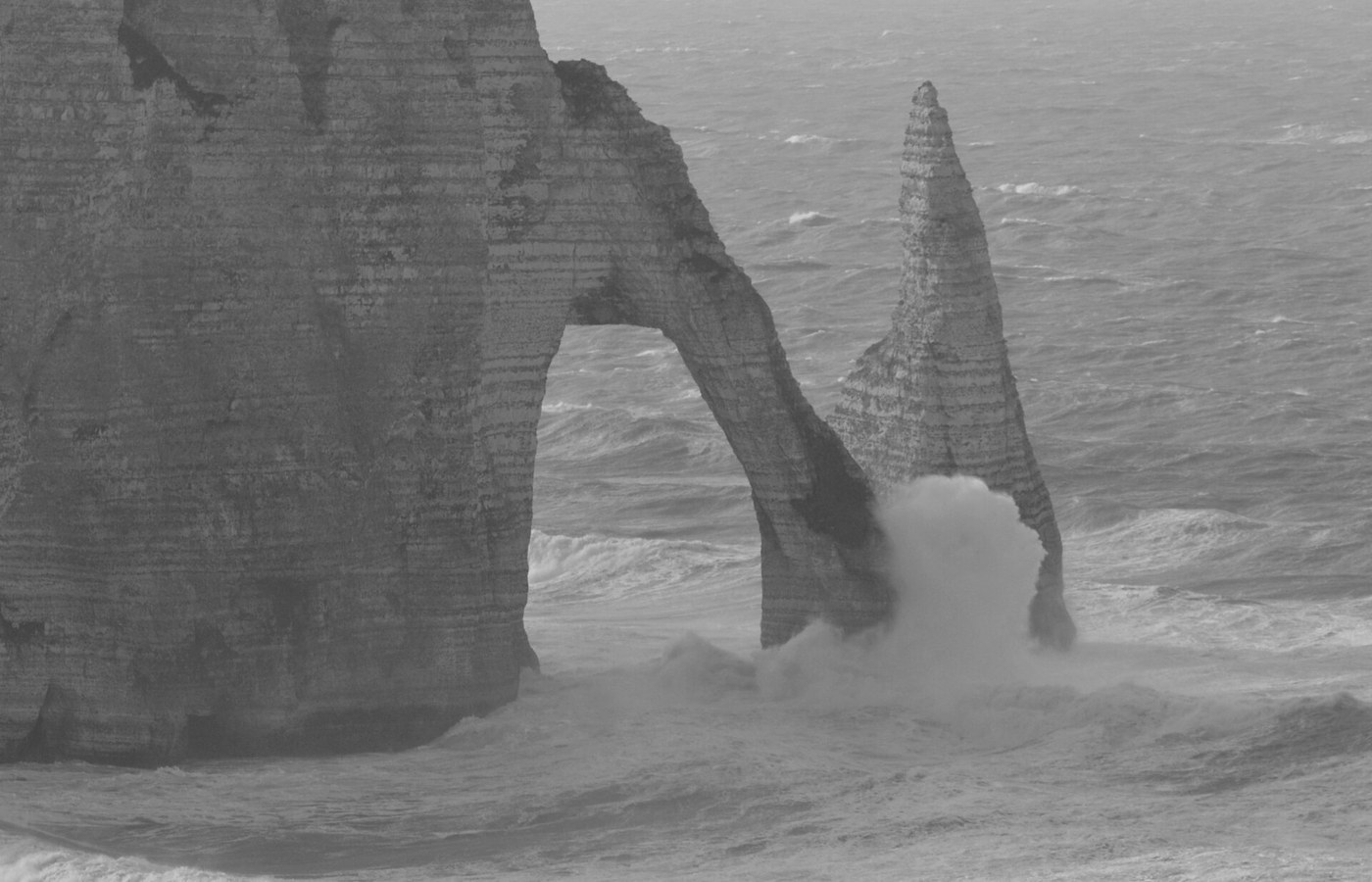 Étretat chalk cliffs at dusk